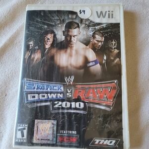 WWE SmackDown vs. Raw 2011 (Nintendo Wii,‎ 2010) Adult owned case/disc/manual